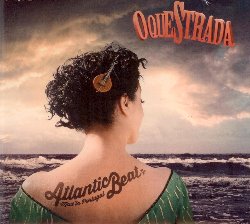 OQUESTRADA :  ATLANTICBEAT MAD' IN PORTUGAL  (JARO)

La formazione Oquestrada  nata da un'idea dell'attrice e cantante di fado Marta Miranda e del poliedrico artista francese Pablo, ai quali si sono affiancati via via altri eccellenti musicisti. Insieme, i due creativi hanno dato vita ad un progetto musicale che ha la forma di una piccola orchestra di quartiere che propone una sorta di swing metropolitano unico nel suo genere che affonda le radici nella musica popolare portoghese. AtlanticBeat Mad' in Portugal  un album che riposiziona il Portogallo: da ingresso secondario dell'Europa, lo eleva a porta d'accesso principale, a splendido balcone dal quale  possibile godersi paesaggi mozzafiato. In questo album di loro originali, Joao Lima, Pablo e Marta Miranda hanno inventato delle sonorit incentrate sulla linea melodica della voce e sul ritmo delle parole, sulle armonie e sui ritmi della chitarra portoghese, affiancata da basso e tamburo bombo. Le melodie filigranate di AtlanticBeat Mad' in Portugal sono interpretate da brillanti musicisti classici e pop come Andr Bahia alla chitarra, Moises Fernandez alla tromba e Marina Henrique e Nelson Almeida alla fisarmonica portoghese. AtlanticBeat Mad' in Portugal  ritmo allo stato puro, un album tutto da ballare!