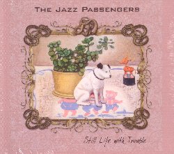 JAZZ PASSENGERS :  STILL LIFE WITH TROUBLE  (YELLOWBIRD)

In occasione del suo trentesimo anniversario, lo storico gruppo di New York formato dai membri originali Curtis Fowlkes (trombone, voce), Roy Nathanson (sax alto e soprano, voce), Brad Jones (basso), E. J. Rodriguez (percussioni) e Bill Ware (vibrafono, voce), a cui si sono aggiunti Sam Bardfeld (violino), Ben Perowsky (batteria) ed il grande Marc Ribot (chitarra), ex membro della formazione che appare in un brano, propone il suo nuovo album Still Life with Trouble. I Jazz Passengers propongono un disco che ben rappresenta lo stile unico ed inimitabile della band che  fatto di elementi appartenenti a diverse realt musicali come jazz, punk, avantgarde, downtown e che, per poter essere pienamente sperimentale si  sempre nutrito anche di suggestioni poetiche e teatrali. Still Life with Trouble contiene nove storie che raccontano il tempo che passa dandogli la forma di una natura morta composta di strani uccelli i cui versi, fatti da una variet di toni, parole, armonie e ritmi, gridano all'ascoltatore che se c' ancora vita, ci sono sicuramente ancora problemi! Grazie al prezioso aiuto del produttore ed engineer Hugo Dwyer, le nove tracce dell'album, tutte composte dai membri della formazione tranne Everybody Plays The Fool (J.R. Bailey, Rudy Clark, Ken Williams), rappresentano un nuovo sentiero nella storia artistica della formazione. Still Life with Trouble  l'equivalente musicale di un quadro cubista in cui gli elementi classici vengono riorganizzati in accostamenti insoliti al solo scopo di giocare con le forme standard e dare vita a nuove ed inaspettate prospettive.