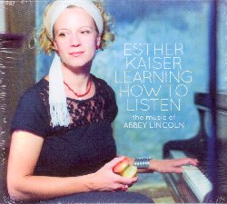 KAISER ESTHER :  LEARNING HOW TO LISTEN - THE MUSIC OF ABBEY LINCOLN  (FINE MUSIC)

In Learning How to Listen - The Music of Abbey Lincoln, l'apprezzata cantante jazz berlinese Esther Kaiser, rende omaggio alla straordinaria interprete americana Abbey Lincoln (1930-2010) di cui ammira la voce, la passione per la musica, il teatro, la poesia e anche il suo costante impegno civile. Nel suo nuovo progetto Esther Kaiser interpreta la musica della sua nota collega nello stesso suo modo idiosincratico ed appassionato, dando vita ad un'esperienza musicale veramente intensa. Tuttavia la cantante berlinese  una delle rare artiste capaci di immergersi nell'opera del proprio idolo, pur mantenendo un approccio a queste musiche del tutto personale. Per questo motivo brani come Love Has Gone Away o A Turtle's Dream hanno un gusto fresco e piacevolmente attuale. Esther Kaiser ha una profonda consapevolezza di ci che significa confrontarsi con il percorso artistico di una brillante stella del jazz americano, cos, invece di emularla, fa quello che la stessa Abbey Lincoln avrebbe fatto: va oltre la tradizione per emergere come un'artista autodeterminata ed impenitente.