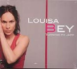 BEY LOUISA :  TURNING ME JAZZ  (ENJA)

Artista parigina dal talento naturale, Louisa Bey ha intrapreso una carriera che potrebbe definirsi eclettica:  autrice, compositrice, pianista e cantante jazz, possiede una laurea in legge, ha lavorato nel mondo della comunicazione ed  anche attrice. Louisa Bey, che ha scelto il proprio nome in onore di Abbey Lincoln,  studia nella prestigiosa Scuola di Atla, dove impara ad esprimere e interpretare in musica le proprie emozioni interiori. E' a partire dal 2002 che decide di dedicarsi interamente alla musica, esibendosi in vari festival e club parigini per arrivare anche fino a Tangeri in Marocco. Dall'esperienza sul palcoscenico nasce l'idea di raccogliere le proprie composizioni in un progetto discografico dal titolo Turning Me Jazz. Eccellente compositrice e interprete, la Bey dimostra in questo splendido cd di riuscire alla perfezione a mantenere un equilibrio delicato fra le proprie composizioni originali dall'andamento folk rock con influenze jazz e le cover come Everything's Brokendi Bob Dylan o Saturday Sun di Nick Drake.