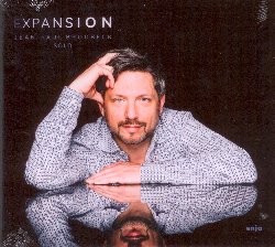 BRODBECK JEAN-PAUL :  EXPANSION  (ENJA)

Expansion, il nuovo elegante album per solo pianoforte di Jean-Paul Brodbeck, propone interessanti riletture di pezzi classici, alcuni standard e composizioni originali del musicista. Davvero speciale  la versione del famoso Preludio in do minore di Fryderyk Chopin che Brodbeck, aggiungendo un suggestivo tocco canoro ed intessendo con il suo strumento i fili della melodia originale con la sua fertile immaginazione, trasforma in qualcosa di meraviglioso ed assolutamente innovativo. L'interpretazione della Danza ungherese di Johann Brahms  un altro momento speciale: si tratta di una complessa serie di idee unite insieme in un tutto senza soluzione di continuit che intriga con la sua aura intricata ma allo stesso tempo trasparente. I due standard, Nobody Else But Me e If I Should Lose You, rappresentano invece un piacevole contrasto con la profondit degli altri pezzi e sono interpretati da Brodbeck con leggerezza e freschezza. Expansion  un disco che parla sia all'intelletto che alla parte pi intuitiva ed irrazionale dell'ascoltatore,  un viaggio sonoro intenso e mai scontato capace di regalare momenti di grande bellezza.