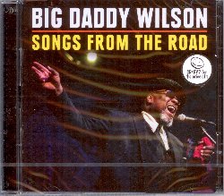 WILSON BIG DADDY :  SONGS FROM THE ROAD (cd+dvd)  (RUF)

In qualunque parte del mondo si trovi, Big Daddy Wilson porta con s il sud. Le storie raccontate nelle canzoni di questo musicista nato in una piccola cittadina del North Carolina ed oggi residente in Europa, evocano immagini di un'America rurale ricordata e descritta con una buona dose di nostalgia. Tuttavia in un'epoca che pullula di demagoghi senza scrupoli, Big Daddy Wilson rivolge la sua attenzione alle piccole cose quotidiane della vita che uniscono gli uomini, come un sorriso o pranzare insieme, e parla di valori importanti come la lealt e la perseveranza. Il nuovo volume della serie di casa Ruf Songs from the Road, composto come sempre da un cd ed un dvd, propone la registrazione live del concerto che il bluesman americano ha tenuto nell'autunno del 2017 al Muhle Hunziken nella cittadina svizzera di Rubigen. Il disco mostra un artista che, grazie al suo naturale carisma e ad una voce ancora molto potente, entusiasma il pubblico con il prezioso supporto di un dinamico quartetto formato da Cesare 'Smokestack' Nolli (chitarra), Paolo Legramandi (basso), Nik Taccori (batteria) ed Enzo Messina (tastiere, pianoforte), tutti in splendida forma. La tracklist  molto varia e comprende atmosfere rilassanti e momenti pi intensi, gioiosa spensieratezza e profonda riflessione in quanto, come dice Big Daddy la scelta di queste canzoni deve riassumere il mio percorso fino a questo momento, i momenti belli e quelli brutti, gli alti ed i bassi. Il dvd di Songs from the Road contiene 15 canzoni tratte dallo stesso concerto e si apre con il brano gospel-blues John the Revelator per chiudersi con Country Boy Medley. Quello che si trova davanti lo spettatore  un performer dal carisma innato a cui interessa solamente trasmettere messaggi positivi attraverso la sua musica ed instaurare un profondo rapporto con il suo pubblico.