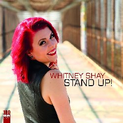 SHAY WHITNEY :  STAND UP!  (RUF)

Stand Up! non  solo il titolo di un disco, ma  anche un'esortazione che porter chiunque ascolti il mix incontenibile di rhythm & blues di Whitney Shay, direttamente sulla pista da ballo! La cantautrice di San Diego, definita dalla prestigiosa rivista Blues Matter Magazine la 'futura icona del blues', presenta un disco che invita a ballare e sognare: 12 canzoni che sono la colonna sonora giusta per i momenti pi alti e quelli pi bassi della vita. Nel suo nuovo progetto registrato nello Wire Record Studio di Austin, insieme al produttore Kaz Kazanoff, Whitney lascia fluire vibrazioni positive e coinvolgenti. Le canzoni sono caratterizzate da una sfacciata combinazione di soul, ritmi avvolgenti ed una voce che sa di fumo e fuoco come si pu ascoltare nel brano che d il titolo all'album e in P.S. It's Not About You. Al suo fianco Whitney ha voluto una band di eccellenti musicisti di cui racconta: Uno dei miei ricordi preferiti  quando con Guy Forsyth abbiamo registrato il duetto Far Apart (Still Close). Nel giro di un'ora cantavamo, sbellicandoci dalle risate. Per i loro brillanti assolo di chitarra nel brano Equal Ground, abbiamo definito Laura Chavez e Derek O'Brien 'Godzilla vs. Mothra' perch entrambi sono due veri mostri di questo strumento! Poi c' Red Young, una leggenda dell'organo che ogni volta riesce ad aggiungere ad ogni pezzo la quantit giusta di soul. Il materiale di Stand Up!, scritto insieme ad Adam J. Eros, riempir le piste di ballo, ma ci porter anche nella testa di Shay, con temi personali e anche socio-politici. Dice l'artista: Sono una donna forte ed indipendente. Visto che sono stata cresciuta da mia madre e mia nonna, molti dei brani di questo disco trattano temi come l'uguaglianza ed il potere delle donne. Che sia dura o piena di dolore, ogni nota di Stand Up!  vera ed arriva immediatamente all'ascoltatore. Le ultime parole spettano all'artista: Quando entro voglio che la gente balli. Per me la musica significa sempre catarsi, scacciare esperienze tristi. Quando il pubblico ritorna a casa con un sorriso e con la sensazione di aver dimenticato le preoccupazioni quotidiane, allora posso dire di aver fatto il mio lavoro.