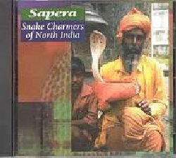 SAPERA :  SNAKE CHARMERS OF NORTH INDIA  (CANYON)

Interessantissima emissione d'esordio per la nuova label di casa Canyon dedicata ai suoni del mondo ed in questo caso ad alcune delle figure pi rappresentative del mondo indiano: gli incantatori di serpenti.  L'ipnotizzante ronzio del pungi (strumento simile all'oboe) e gli sferzanti ritmi delle percussioni (premtal e kanyeri)  accompagnano lo spettacolo che da sempre cattura l'immaginazione di grandi e bambini e che ci viene splendidamente proposto dalle esaustive informazioni e dalle foto contenute nel booklet.  Vestiti con colorati costumi tradizionali, durante le loro esibizioni i Sapera (questo il nome degli incantatori del nord dell'India) non stanno mai troppo lontani dal cesto che contiene il serpente - normalmente un cobra catturato da loro stessi nella giungla - per poter riuscire a rendere innocuo il mortale animale grazie ad una combinazione di musica e stimolazioni visive ipnotiche. Un album veramente unico per farci scoprire le affascinante sonorit di un'arte che perdura da secoli e che continuer ancora a stimolare la fantasia degli uomini.