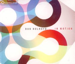 HOLROYD BOB :  IN MOTION  (SOUNDS TRUE)

C'� un impulso costante, ma delicato, deciso e non esclusivamente rivolto alla meta da raggiungere, che da sempre spinge l'uomo verso un cammino di crescita spirituale. In Motion di Bob Holroyd � un'affascinante metafora musicale di questo viaggio interiore, creata pensando alle esigenze di chi pratica yoga. L'album inizia con tranquillit� ed introspezione, per poi progredire gradualmente e farsi sempre pi� intenso fino a raggiungere un picco emozionale dopo il quale le melodie riportano l'ascoltatore in uno stato di serena ricettivit�. La musica di Bob Holroyd - con una serie di hits internazionali apparse nelle pi� importanti compilation come Pure Global Chillout della Ministry of Sound, The Essential Mix di Fran�ois K, Buddha Beats dei Coldcut e Sun dell'inventore del Buddha Bar Claude Challe - sfugge a qualsiasi categorizzazione: � stata definita ambient, elettronica globale, world chill, abstract dance o anche un interessante mix di tutto questo. Con una strumentazione che comprende flauto ney, basso, sax, chitarra acustica, tromba, tastiere e leggere percussioni, In Motion � un ottimo sottofondo per praticare yoga, ma � anche una colonna sonora perfetta per una serata tra amici.