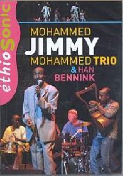 MOHAMMED MOHAMMED JIMMY & BENNINK HAN :  DVD / ETHIOSONIC  (BUDA)

Filmato durante il memorabile concerto dell'aprile 2006 tenutosi all'interno del programma del festival parigino Banlieues Blues, questo film  un tributo al grande cantante etiope Mohammed Jimmy Mohammed, scomparso nel dicembre di quell'anno. Oltre al concerto che vede la partecipazione del trio del cantante africano affiancato dal mitico batterista di free jazz (ed altro) Han Bennink, questo dvd di oltre 80 minuti, contiene diversi bonus e contributi extra compresa un'intervista a Mohammed che racconta della sua cecit, della sua fede e della sua arte. La formazione comprende Mohammed Jimmy Mohammed voce, Messel Asmamaw krar (arpa etiope) e voce, Asnaqu Guebreyes kebero (percussione) e voce, Han Bennink batteria. Il DVD fa parte della serie Ethiosonic, dedicata agli odierno rimti etiopi, di qualsiasi forma e tipo.