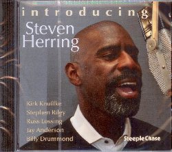 HERRING STEVEN :  INTRODUCING  (STEEPLECHASE)

Il titolo Introducing  un po' fuorviante visto che il baritono Steven Herring ha gi fatto il suo debutto come artista discografico l'anno scorso nell'opera Witness di Kirk Knuffke che ha ricevuto numerose recensioni entusiastiche anche per la straordinaria interpretazione canora di Steven. Introducing  l'album di debutto nei panni di leader del talentuoso baritono diplomatosi a pieni voti nella prestigiosa Julliard School di New York, una delle principali scuole di arti, musica e spettacolo del mondo. Con al suo fianco Kirk Knuffke (corno), Stephen Riley (sax tenore), Russ Lossing (pianoforte), Jay Anderson (basso) e Billy Drummond (batteria), Steven Herring mostra il suo talento abbagliante di cantante jazz alla scoperta della tradizione del Great American Songbook. Con una track list contente brani molto belli e variegati come Begin the Beguine di Cole Porter, They Can't Take That Away From Me di George ed Ira Gershwin, The Girl from Ipanema di Antonio Carlos Jobim e Norman Gimbel, They Say It's Wonderful di Irving Berlin e molti altri ancora, Introducing  un album da ascoltare e riascoltare lasciandoci trasportare lontano dalla suadente voce di Steven Herring.