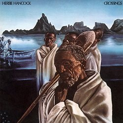 HANCOCK HERBIE :  CROSSINGS  (SPEAKERS CORNER)

(Warner BS 2617) Herbie Hancock (el-p, p, mellotron, perc); Bennie Maupin (ss, fl, b-cl, fl, perc); Eddie Henderson (tp, fhg, perc); Julian Priester (tb, perc); Patrick Gleeson (synth); Buster Williams b, perc); Billy Hart (dr, perc) - Registrato nel febbraio del 1972 ai Pacific Recording Studios, San Mateo, California, da Patrick Gleason. Prodotto da David Rubinson. Negli anni '70 il disco Crossings di Herbie Hancock era immancabile sugli scaffali delle librerie di molti studenti amanti del jazz fusion. La copertina dalle sfumature psichedeliche del disco aveva sicuramente favorito e facilitato la sua popolarit�, anche se non era chiaro dove questi incroci avrebbero condotto il pubblico. Ma c'� altro: l'eccellente trombettista Eddie Henderson, spesso sottostimato come improvvisatore e compositore, e Bennie Maupin che come Hancock era cresciuto sotto l'ala protettrice di Miles Davis, suonano un numero incredibile di strumenti come si usava fare in quel periodo. Sintetizzatore e mellotron erano membri permanenti della formazione di Hancock ed in Crossings producono addirittura archi melodici. Se Quasar di Bennie Maupin lancia il gruppo e l'ascoltatore in territori extraterrestri, come affermato da qualche critico, � un punto controverso. Di certo Crossings pu� essere considerato un documento storico, ma questo non implica che le sue sonorit� siano antiquate, al contrario. Si tratta di un disco fuori dal tempo e per questo anche gli ascoltatori pi� giovani troveranno piacere nell'ascoltare questo straordinario esperimento del secolo scorso.