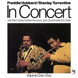 HUBBARD FREDDIE / TURRENTINE STANLEY :  IN CONCERT - VOLUME ONE+TWO  (SPEAKERS CORNER)

(CTI-60449) Freddie Hubbard (tp); Stanley Turrentine (sax); Eric Gale (g); Herbie Hancock (p); Ron Carter (b); Jack DeJohnette (dr) - Registrato nel marzo del 1973 live al Chicago Opera House ed al Ford Auditorium di Detroit da Charles Buchanan. Remixato da Rudy Van Gelder. Prodotto da Creed Taylor. Il produttore ha davvero avuto molto intuito quando nel 1973, in occasione di un piccolo tour americano, registr le performances di alcuni degli artisti di punta dell'etichetta CTI. Liberati dall'atmosfera spesso sterile di uno studio, Freddie Hubbard, Stanley Turrentine ed alcuni loro amici hanno dato libero sfogo al proprio incredibile talento improvvisativo. La formazione comprende i mostri sacri Herbie Hancock, Ron Carter e Jack deJohnette, tutti allievi di Miles Davis, ai quali si  aggiunto il meno noto Eric Gale, un eccellente chitarrista che ha portato il caldo ritmo giamaicano negli inverni di Chicago e Detroit. La scelta del produttore di proporre due versioni di Gibraltar (Freddie Hubbard) e di Hornets (Herbie Hancock), una registrata a Chicago e l'altra a Detroit,  comprensibile considerando l'altissimo livello creativo dei musicisti. Ha senso anche proporre due Lp insieme, in origine pubblicati separatamente, poich entrambi forniscono un'importante testimonianza degli anni tra il 1970 ed il 1975, cio di quel periodo in cui gli appassionati di jazz della vecchia scuola erano sconvolti dai nuovi strumenti elettrici e dal fuoco della nuova generazione di musicisti. A quei tempi, alcuni si saranno tappati le orecchie per l'orrore ascoltando questo disco, mentre oggi l'unica cosa che si pu pensare  che In Concert - Volume One+Two  un album strepitoso e rivoluzionario che dovrebbe far parte della collezione di qualsiasi amante del jazz.