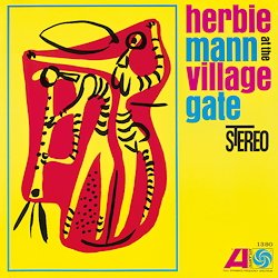 MANN HERBIE :  HERBIE MANN AT THE VILLAGE GATE  (SPEAKERS CORNER)

(Atlantic SD 1380) Herbie Mann (fl); Hagood Hardy (vib); Ahmad Abdul-Malik, Ben Tucker (b); Rudy Collins (dr); Chief Bey (dr, perc); Ray Mantilla (cga, perc) - Registrato dal vivo nel novembre del 1961 al The Village Gate, New York City da Tom Dowd e Phil Lehle. Prodotto da Nesuhi Ertegun. Comin 'Home Baby  il brano d'apertura del disco Herbie Mann at the Village Gate ed  anche l'album che ha reso Mann una delle superstar del jazz targato Atlantic. Conosciuto come 'il nostro uomo con il flauto', gi nei primi anni '60 Herbie Mann era molto ben visto dalla critica, ma fu attraverso la creazione di alcune colonne sonore ed in seguito di qualche produzione piuttosto commerciale che il musicista divenne davvero famoso. In Herbie Mann at the Village Gate, disco registrato dal vivo nel leggendario locale notturno Village Gate, Mann offre puro jazz di altissimo livello, il che non sorprende, considerando il gruppo ritmico che comprende Ahmad Abdul-Malik e Rudy Collins. Il compositore di Comin 'Home Baby, Ben Tucker, fa la sua apparizione come solista ospite, prima che i due brani tratti da Porgy And Bess di George Gershwin regalino all'intero disco un'ondata di ritmo. Nelle note di copertina del disco, Willis Conover, uno dei presentatori pi famosi del Newport Jazz Festival (gli appasionati fan di jazz pi attempati ricorderanno la sua voce baritonale ascoltate nelle trasmissioni dell'AFN), descrive in dettaglio il background etnico dei musicisti che provengono da tutto il mondo, dalla Romania fino a Porto Rico. I tre pezzi della track list sono interpretati in un modo davvero originale che potrebbe essere descritto come un gustoso cocktail al flauto. Il disco Herbie Mann at the Village Gate, una vera rarit dei tesori dell'Atlantic dei primi anni '60,  stato per molto tempo non disponibile, ma finalmente la nuova edizione della Speakers Corner pone rimedio a tale mancanza.