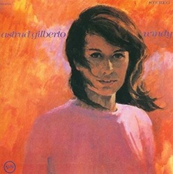 GILBERTO ASTRUD :  WINDY  (RADIATION RECORDS)

�Windy� di Astrud Gilberto, � una boccata d�aria fresca in una calda giornata estiva. La regina brasiliana della bossa nova trasporta l�ascoltatore in un paradiso tropicale con la sua voce rilassante e ritmi contagiosi. Fin dal primo istante, � impossibile non lasciarsi conquistare dal fascino naturale e dall�innegabile talento della Gilberto. Ogni brano del disco � una lezione di musicalit�, caratterizzato da arrangiamenti ricchi e melodie raffinate che regalano la sensazione di rilassarsi su una spiaggia di Rio de Janeiro. Tuttavia, �Windy� non � fatto solo di sole e samba: l�artista affronta anche temi pi� introspettivi, esplorando l�amore, la perdita e lo scorrere del tempo con una grazia toccante, capace di scaldare il cuore e, al contempo, di evocare una dolce malinconia. Brani come �Lost in the Paradise� e �Without Him� ??mettono in luce la profondit� emotiva e la versatilit� della Gilberto, dimostrando che il suo talento va ben oltre un unico registro espressivo.